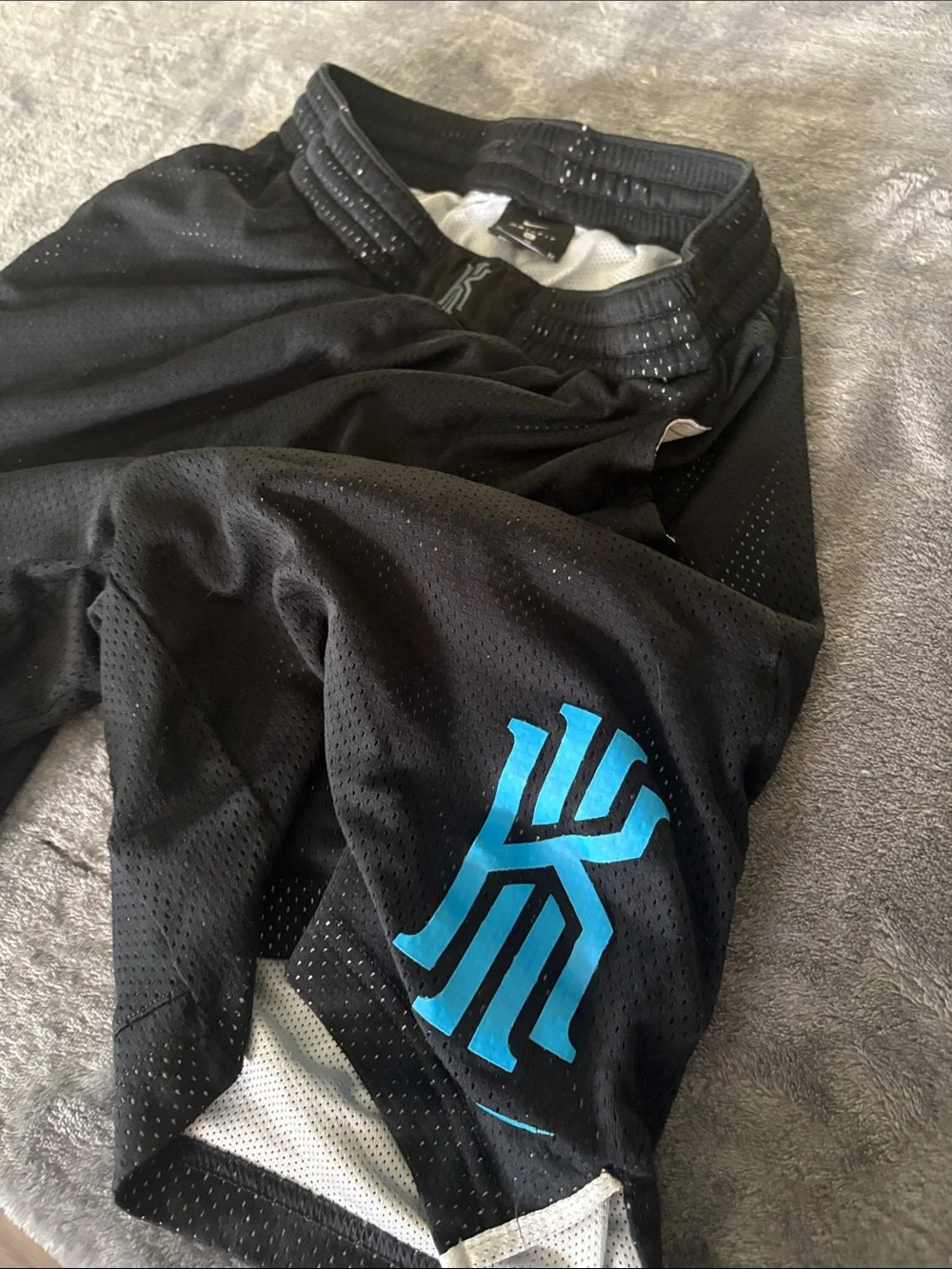 Nike Black Kids Mesh Shorts with Bright Blue Logo